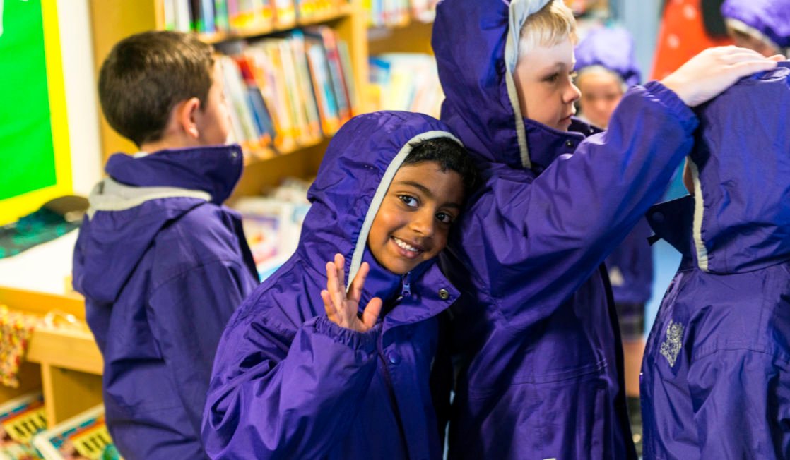 wycliffe kids wearing trenchcoats