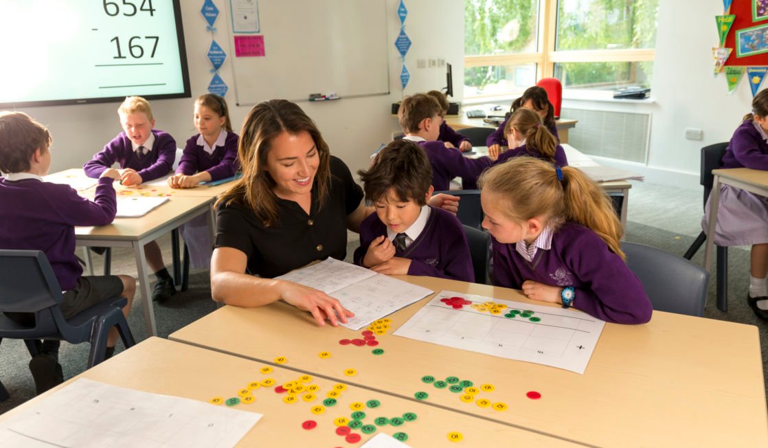 teacher giving one on one learning at Wycliffe prep school